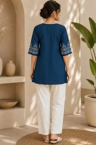 Women's stylish blue ethnic kurti with white pant co-ord set