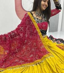 NAVRATRI WEAR YELLOW RAYON THREAD SEQUINCE EMBROIDERED LEHENGA CHOLI DUPATTA FREE SIZE FULL-STITCHED.