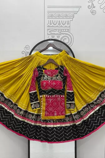 NAVRATRI WEAR YELLOW RAYON THREAD SEQUINCE EMBROIDERED LEHENGA CHOLI DUPATTA FREE SIZE FULL-STITCHED.