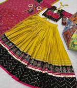 NAVRATRI WEAR YELLOW RAYON THREAD SEQUINCE EMBROIDERED LEHENGA CHOLI DUPATTA FREE SIZE FULL-STITCHED.