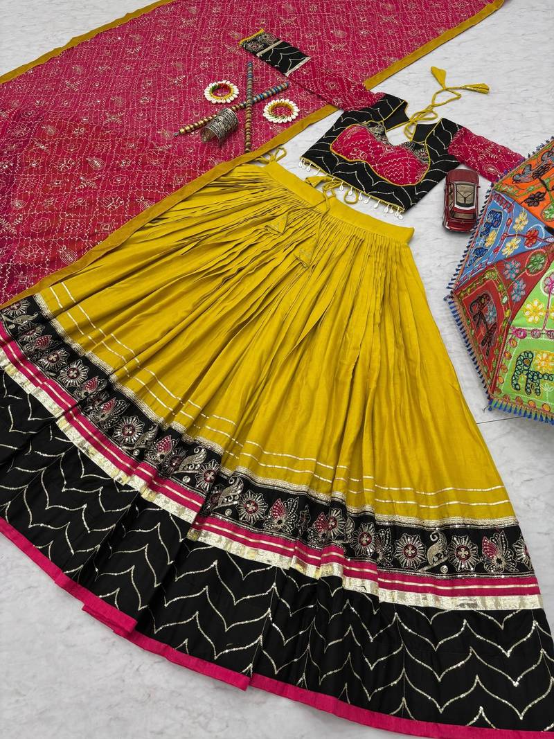NAVRATRI WEAR YELLOW RAYON THREAD SEQUINCE EMBROIDERED LEHENGA CHOLI DUPATTA FREE SIZE FULL-STITCHED.