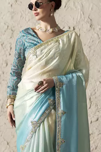 Aqua blue & off white saree with gold embroidery work fancy fabric saree with blouse