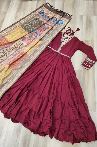 Maroon roamn silk free size stitched anarkali suit with mirror lace work
