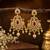 Traditional gold plated chandbali earrings with cz stones, ruby pink & green stones, pearl drops for women