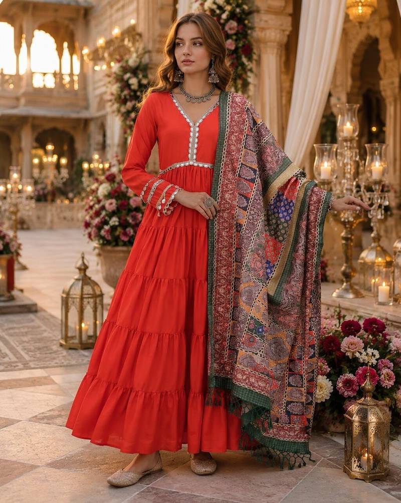 Orange roamn silk free size stitched anarkali suit with mirror lace work
