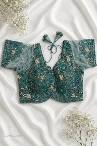 Powder blue designer blouse with heavy floral embroidery & sequins