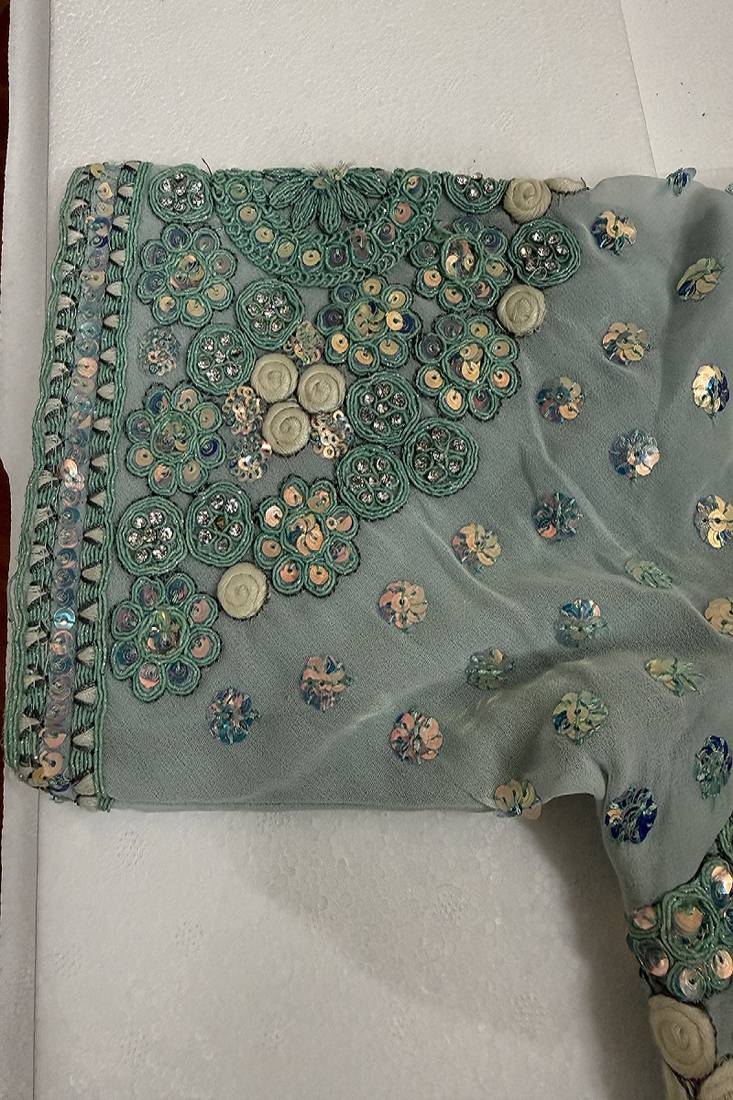 Powder blue designer blouse with heavy floral embroidery & sequins