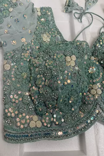 Powder blue designer blouse with heavy floral embroidery & sequins