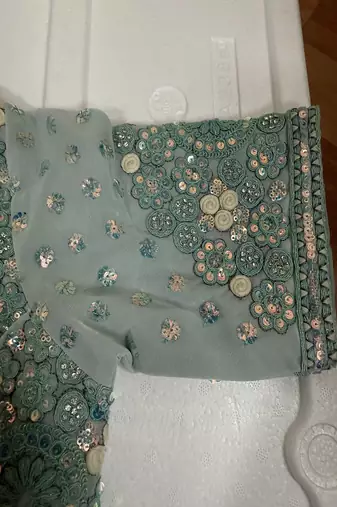 Powder blue designer blouse with heavy floral embroidery & sequins