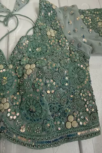 Powder blue designer blouse with heavy floral embroidery & sequins