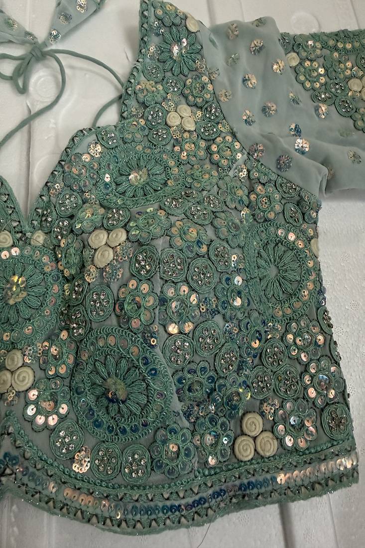 Powder blue designer blouse with heavy floral embroidery & sequins