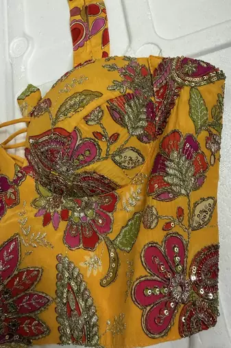 Mustard yellow silk corset blouse with kalamkari prints & sequins