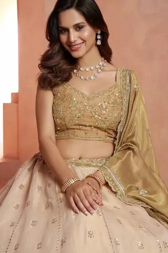 Graceful Gold Lehenga Featuring Handcrafted Embroidery