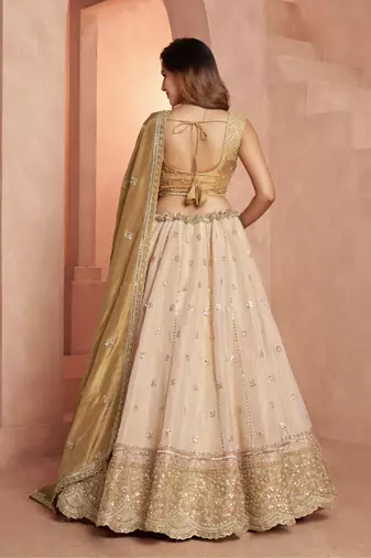 Graceful Gold Lehenga Featuring Handcrafted Embroidery