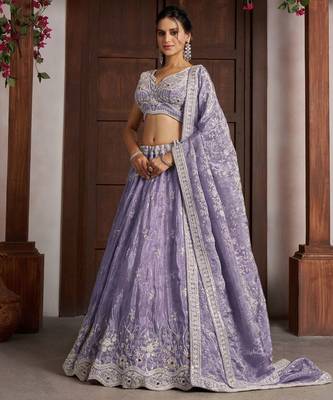 Luxurious Purple Banarasi Tissue Lehenga Adorned with Bead Embellishments 1