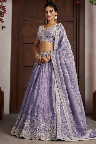 Luxurious Purple Banarasi Tissue Lehenga Adorned with Bead Embellishments