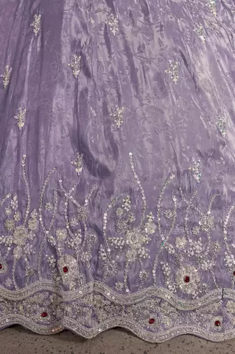 Luxurious Purple Banarasi Tissue Lehenga Adorned with Bead Embellishments