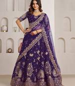 Luxurious Purple Lehenga Featuring Intricate Floral and Bird Designs