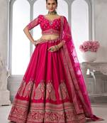 Luxurious Purple Lehenga Featuring Intricate Floral and Bird Designs