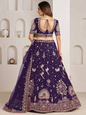 Luxurious Purple Lehenga Featuring Intricate Floral and Bird Designs 3