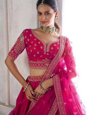 Luxurious Purple Lehenga Featuring Intricate Floral and Bird Designs 2