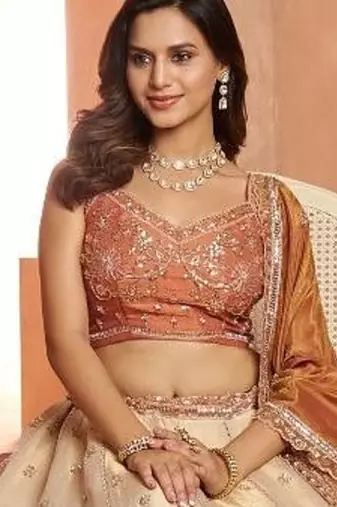Dreamy Rust Cream Girlish Lehenga with Handcrafted Embellishments