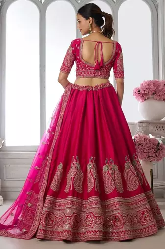 Luxurious Purple Lehenga Featuring Intricate Floral and Bird Designs