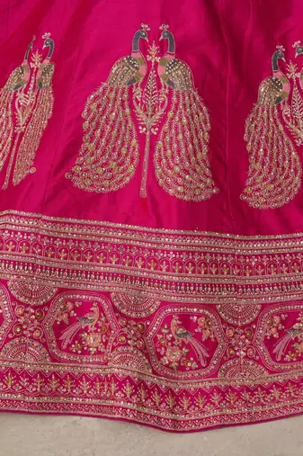 Luxurious Purple Lehenga Featuring Intricate Floral and Bird Designs