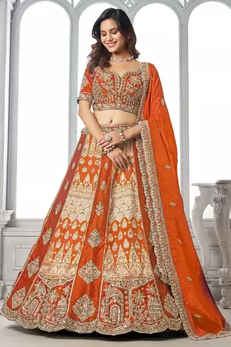 Elegant Rust Lehenga Featuring Rich Raw Silk and Artisan Craftsmanship