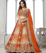 Elegant Rust Lehenga Featuring Rich Raw Silk and Artisan Craftsmanship