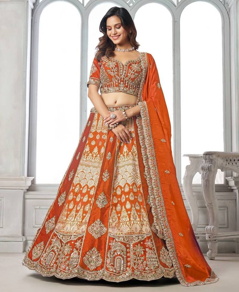 Elegant Rust Lehenga Featuring Rich Raw Silk and Artisan Craftsmanship