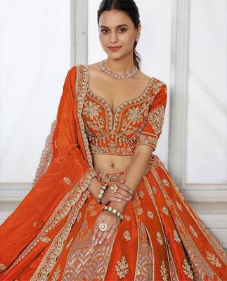 Elegant Rust Lehenga Featuring Rich Raw Silk and Artisan Craftsmanship 2