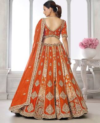 Elegant Rust Lehenga Featuring Rich Raw Silk and Artisan Craftsmanship 3