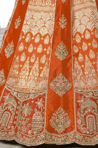 Elegant Rust Lehenga Featuring Rich Raw Silk and Artisan Craftsmanship