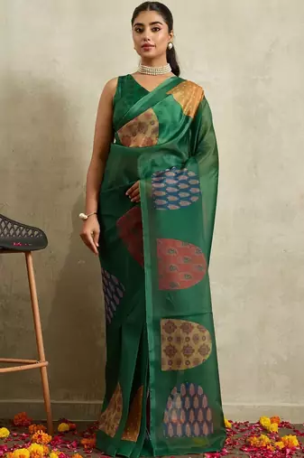 Green printed tissue festive wear saree with blouse piece