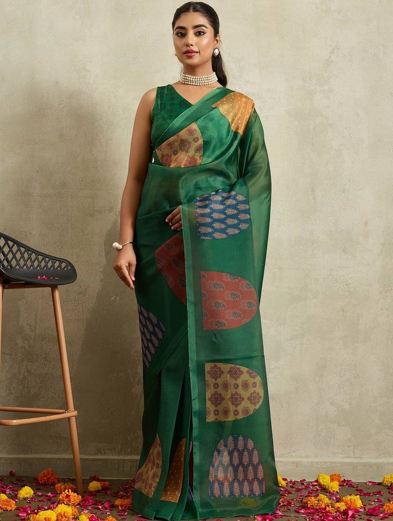 Green printed tissue festive wear saree with blouse piece