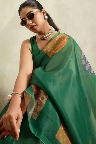Green printed tissue festive wear saree with blouse piece