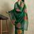 Green printed tissue festive wear saree with blouse piece