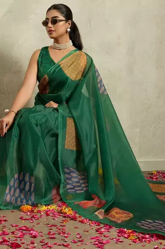 Green printed tissue festive wear saree with blouse piece