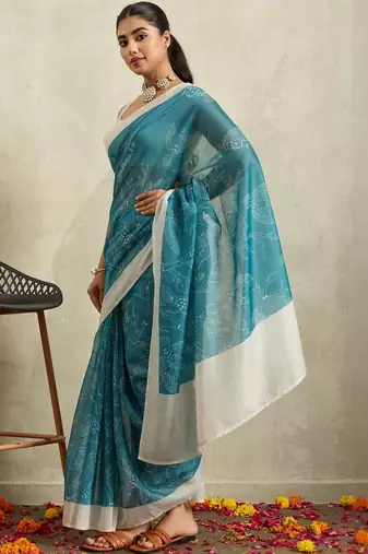 Teal printed blended cotton designer saree with blouse piece