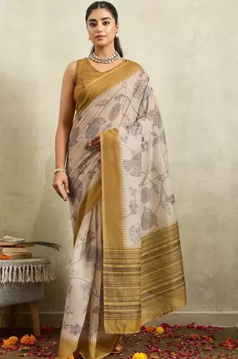 Cream printed blended cotton designer saree with blouse piece