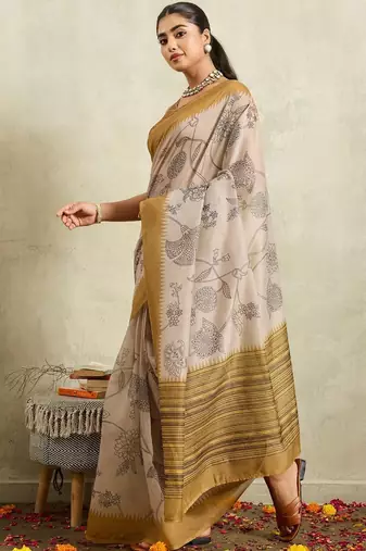 Cream printed blended cotton designer saree with blouse piece