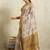 Cream printed blended cotton designer saree with blouse piece