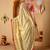 Cream printed art silk traditional saree with blouse piece