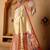 Cream printed art silk traditional saree with blouse piece