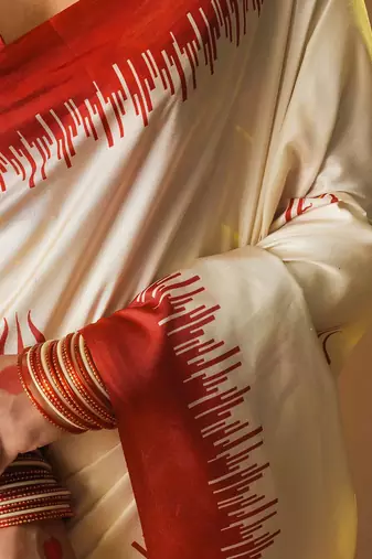 Off white printed art silk traditional saree with blouse piece
