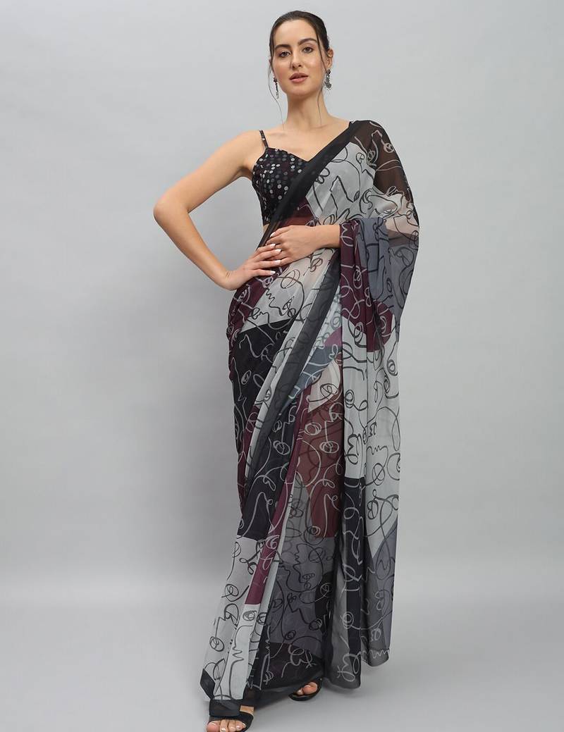 Purple elegant printed georgette saree with blouse piece