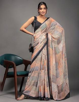 Orange elegant printed georgette saree with blouse piece 2
