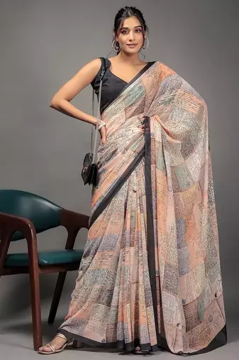 Orange elegant printed georgette saree with blouse piece