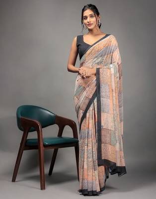 Orange elegant printed georgette saree with blouse piece 3